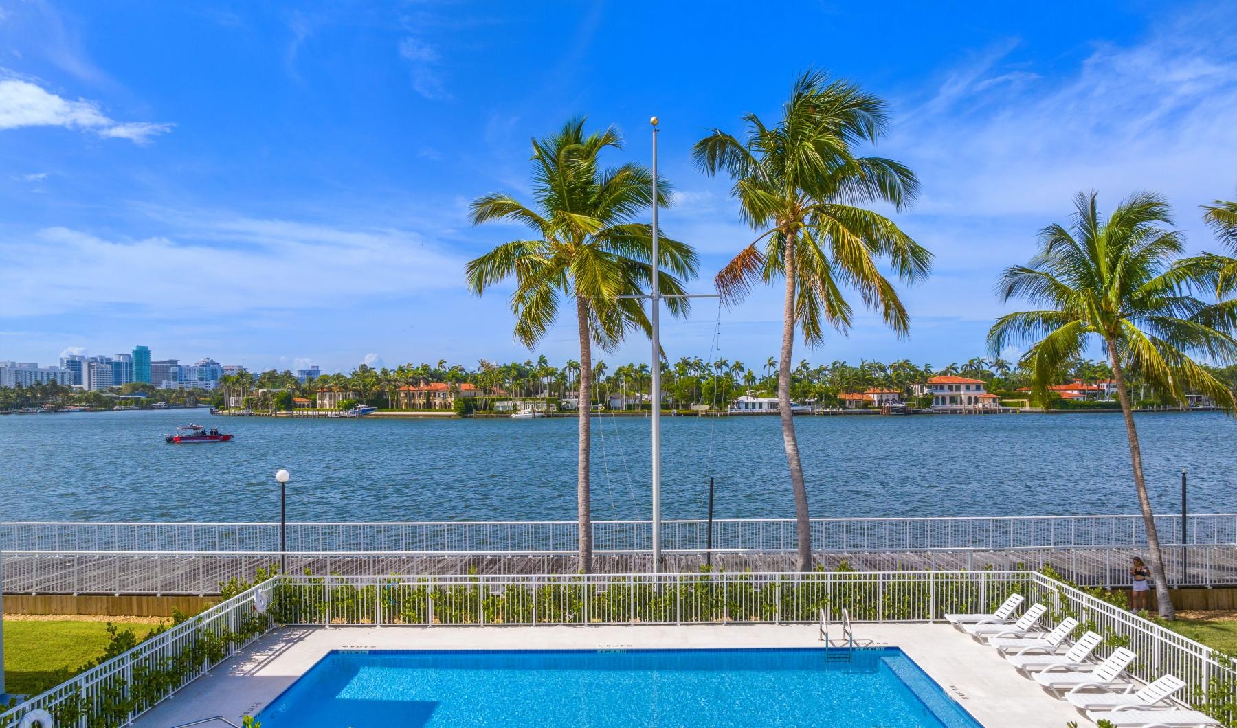 a pool next to a beach