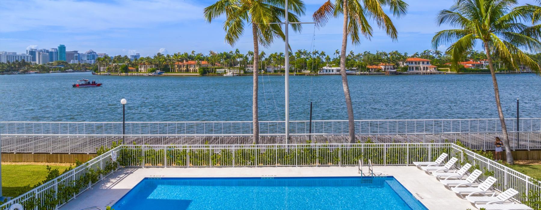 a pool next to a beach